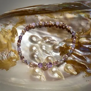 Arpaia 7.25" one of a kind stretch bracelet with cultured pearls, glass, Swarovski crystal, and artisan-crafted 999 fine silver.
