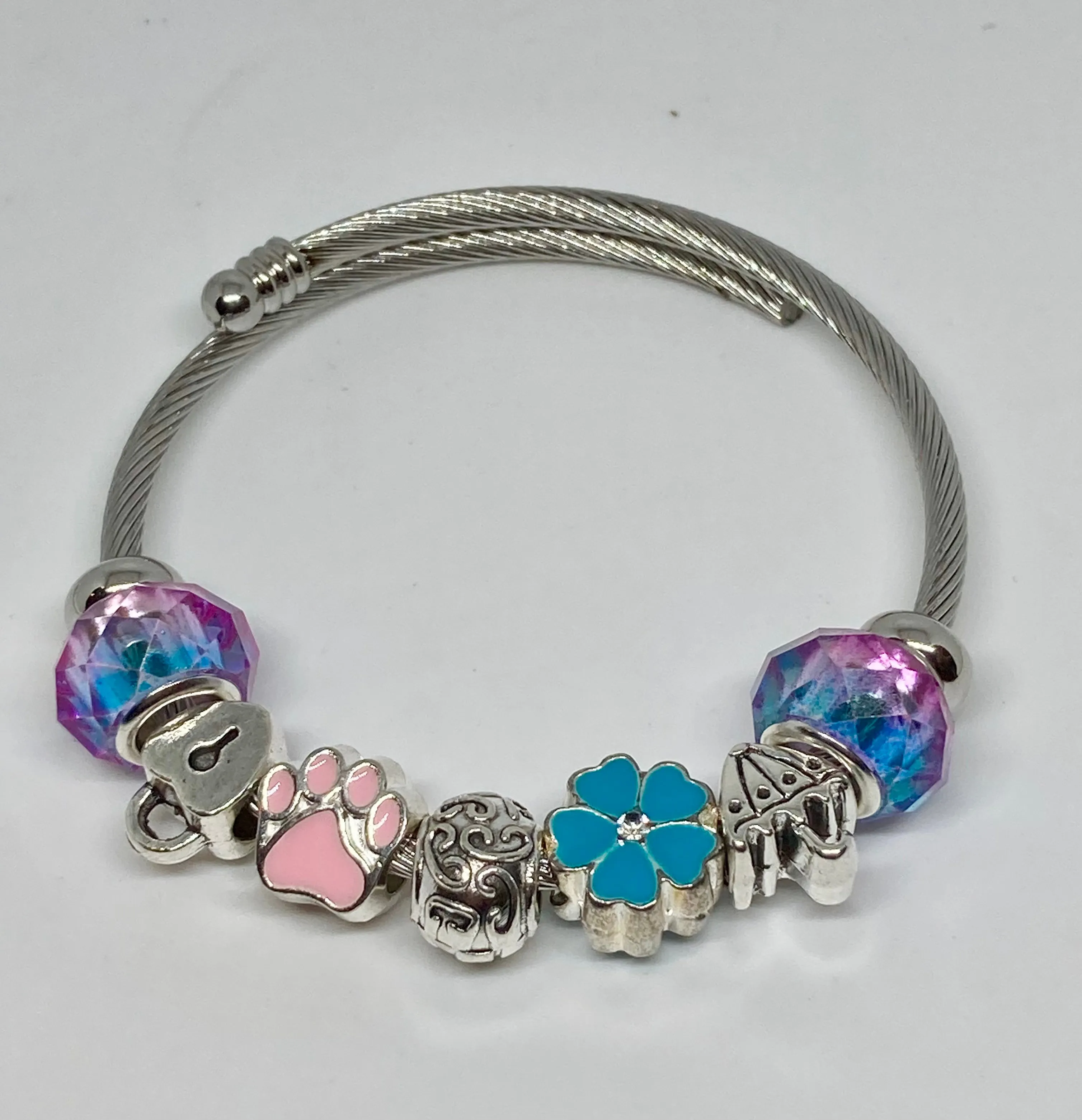 Brenda Blue Purple and pink Stainless Expandable Easy to put on stretch memory wire Charm Bracelet. One size fits most