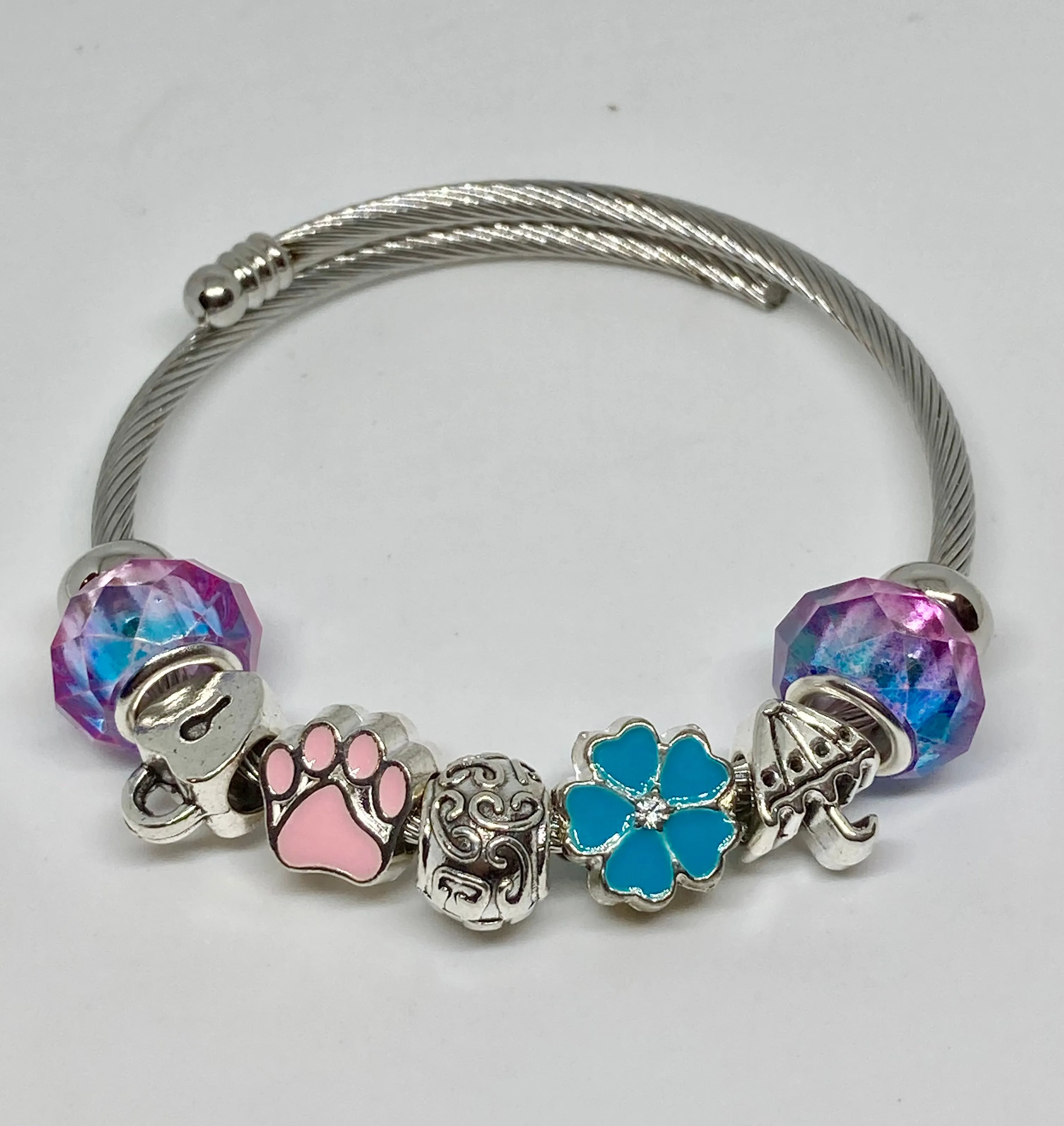 Brenda Blue Purple and pink Stainless Expandable Easy to put on stretch memory wire Charm Bracelet. One size fits most