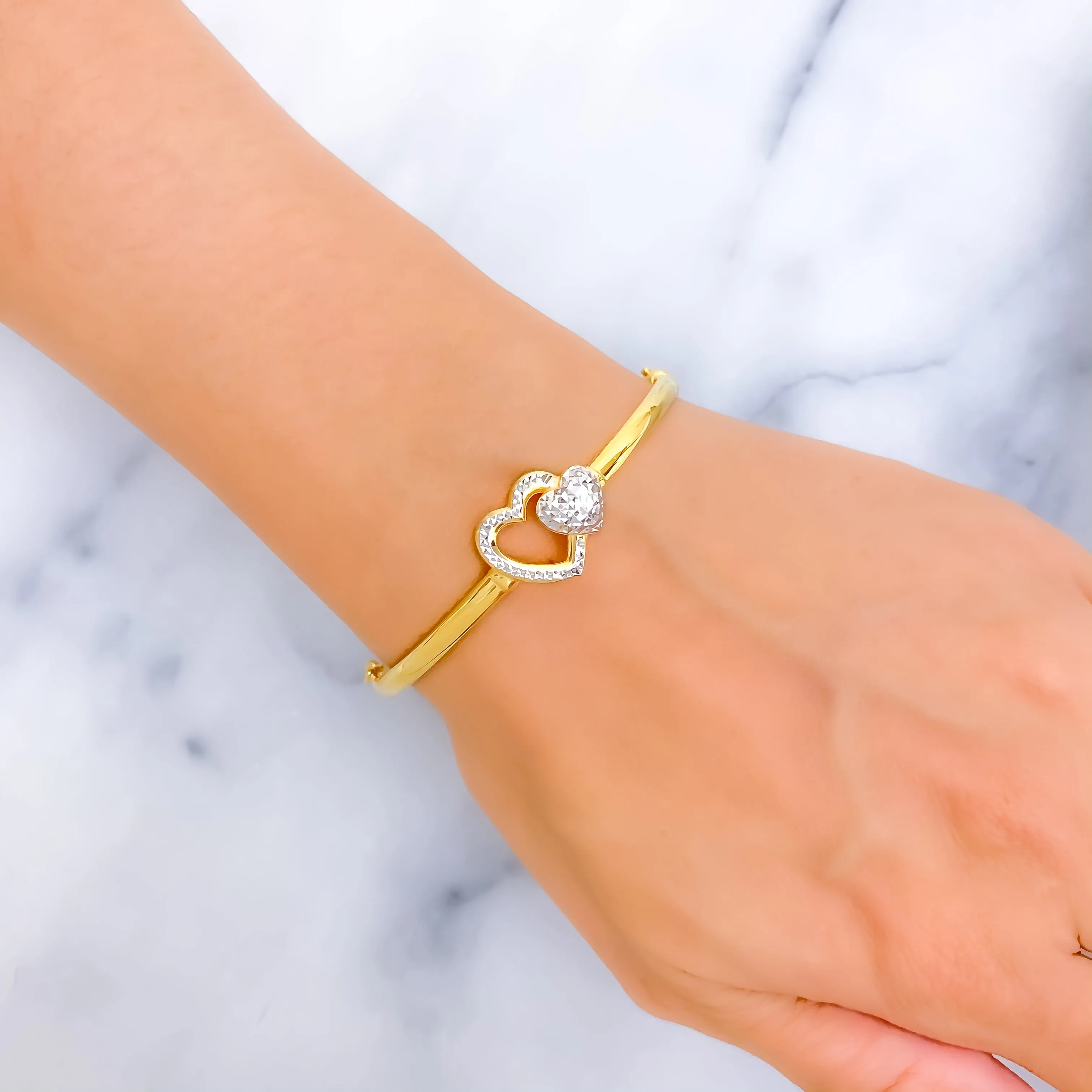 Captivating Twin Heart 22k Gold Bangle Bracelet