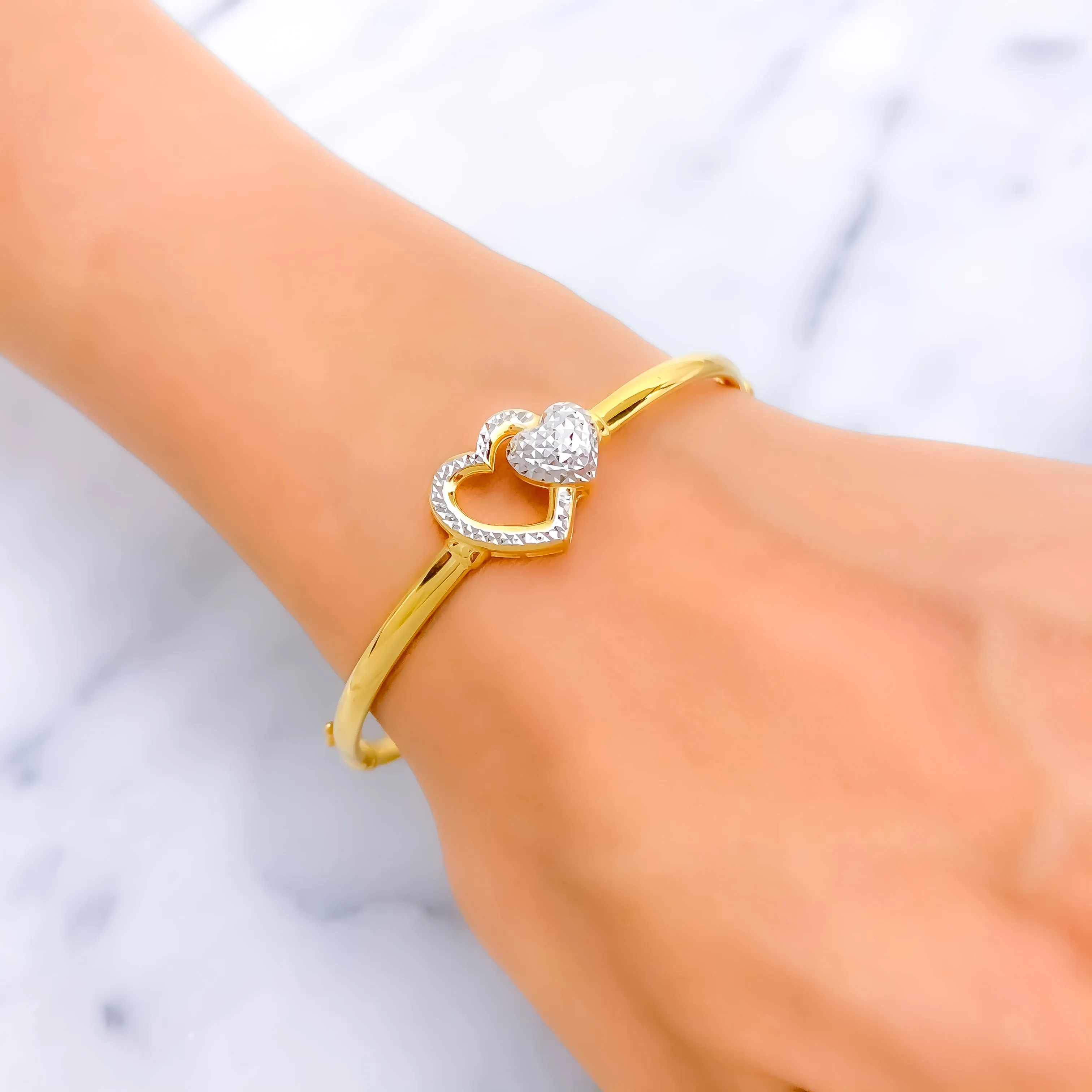 Captivating Twin Heart 22k Gold Bangle Bracelet