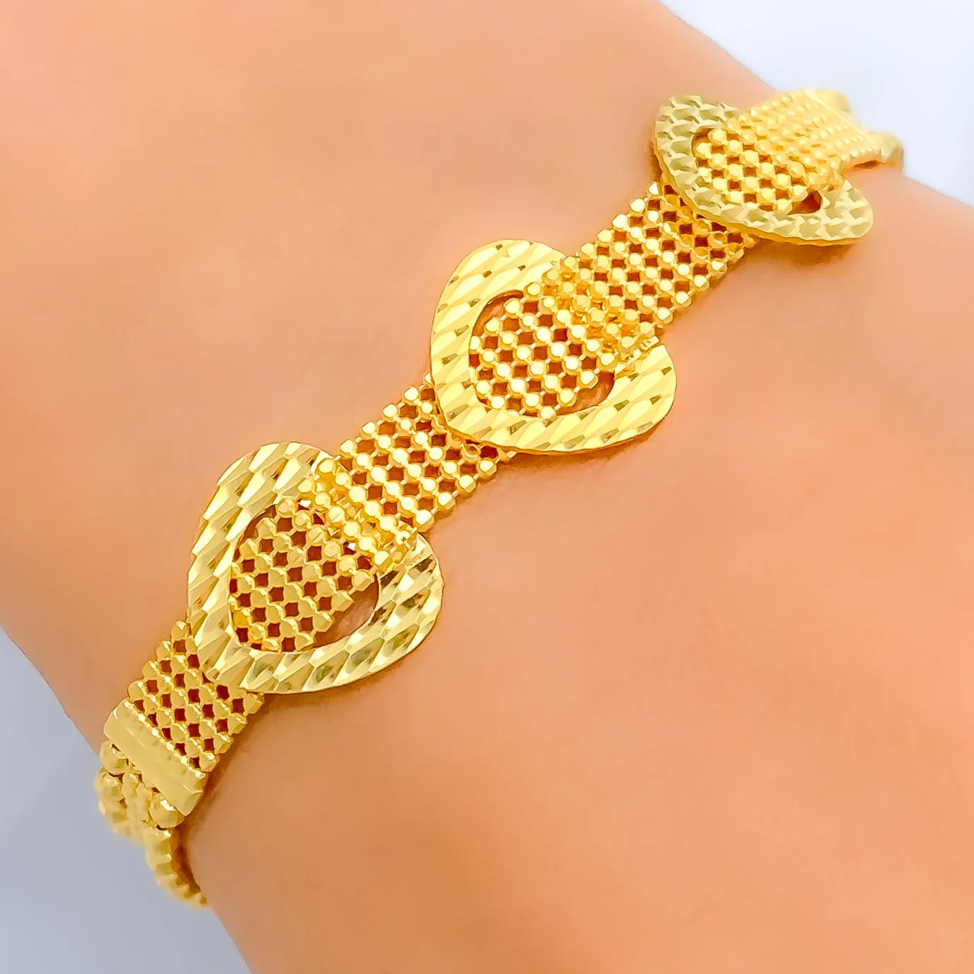 Dazzling Triple Heart 22k Gold Bracelet