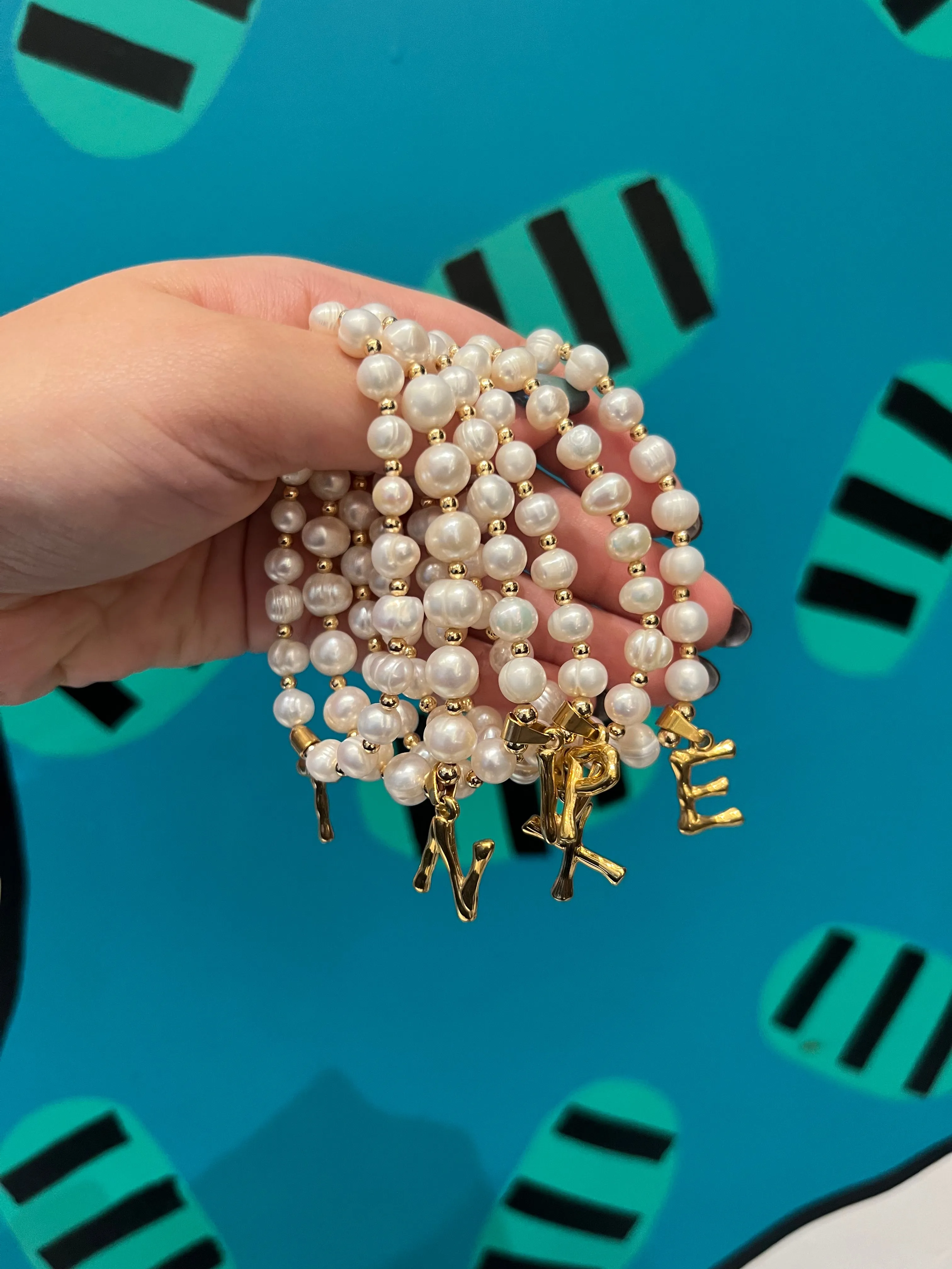 E-HC DESIGNS- Letter Initial Pearl-Gold Elastic Bracelet