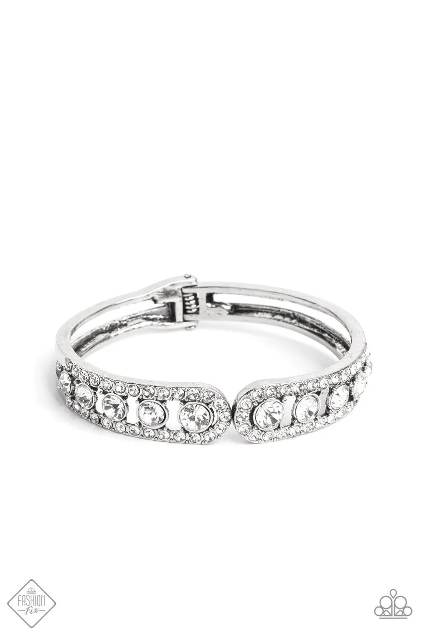 Spellbinding Splendor - White - Rhinestone Blingy Paparazzi Hinge Bracelet - January 2023 Fiercely 5th Avenue