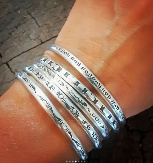 Sterling silver stacking bracelets with hand stamped patterns as singles or a set