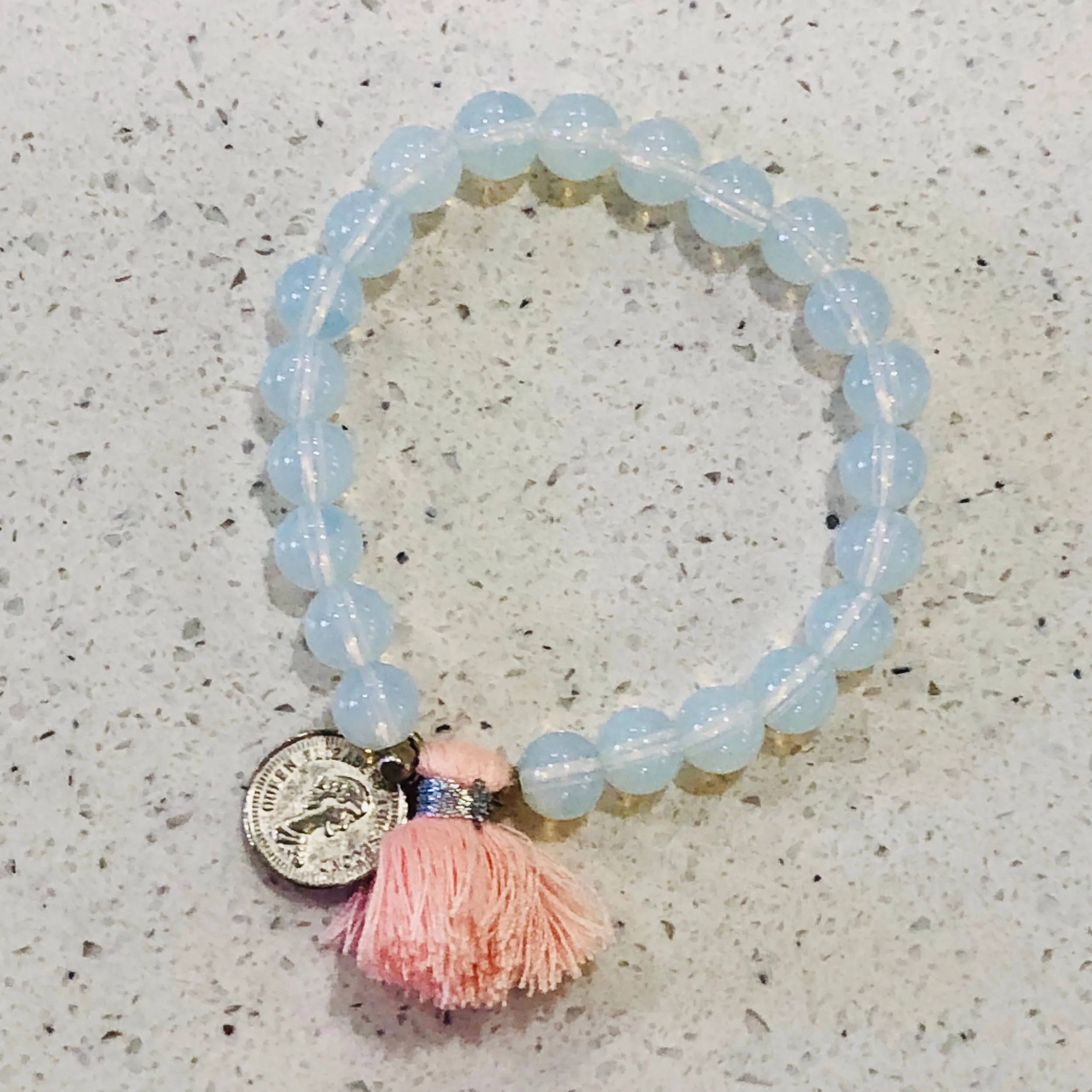 TM. Moon Bead Coin & Tassel Bracelet