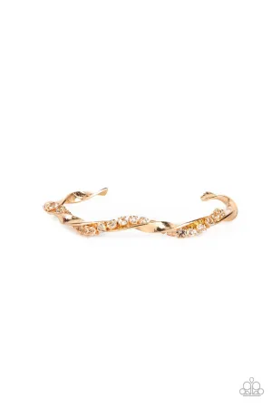 Twisted Twinkle - Gold - White Rhinestone Warped Paparazzi Cuff Bracelet